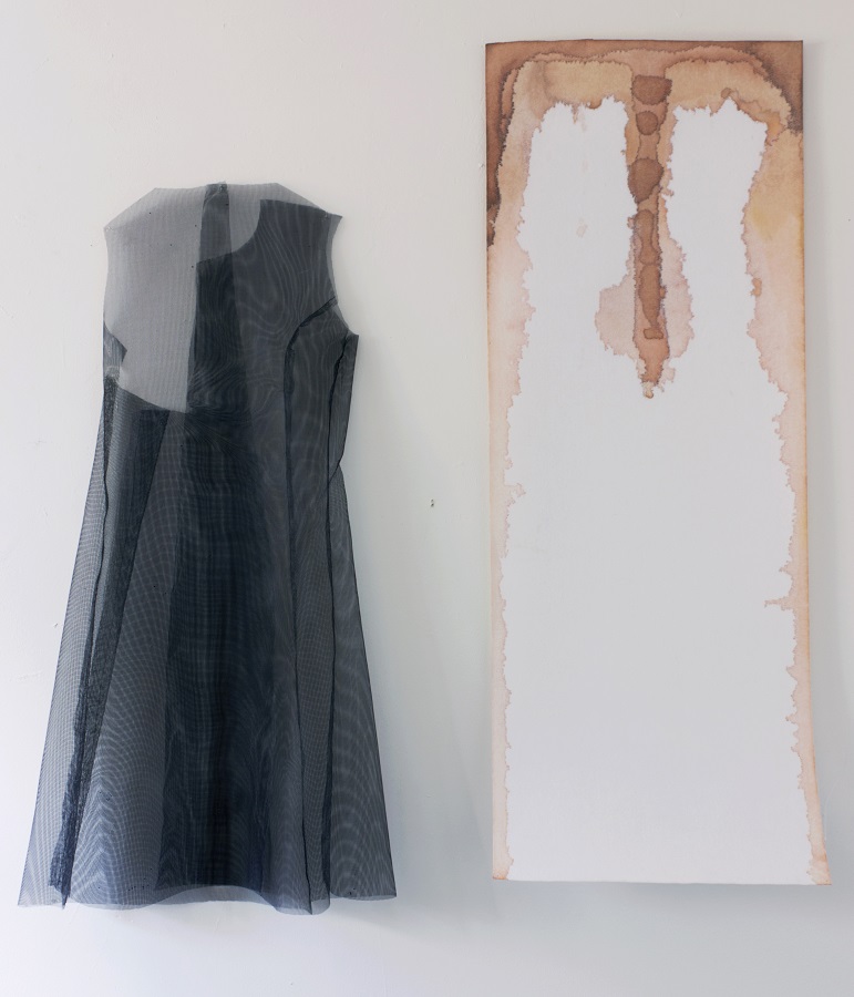 Diana Puglisi, Bringing the Absence Presence, 2015. Window screen, thread, acrylic paint, fabric dye, and interfacing, 46 x 22 inches (left), 52 x 20 inches (right). Courtesy of the artist.